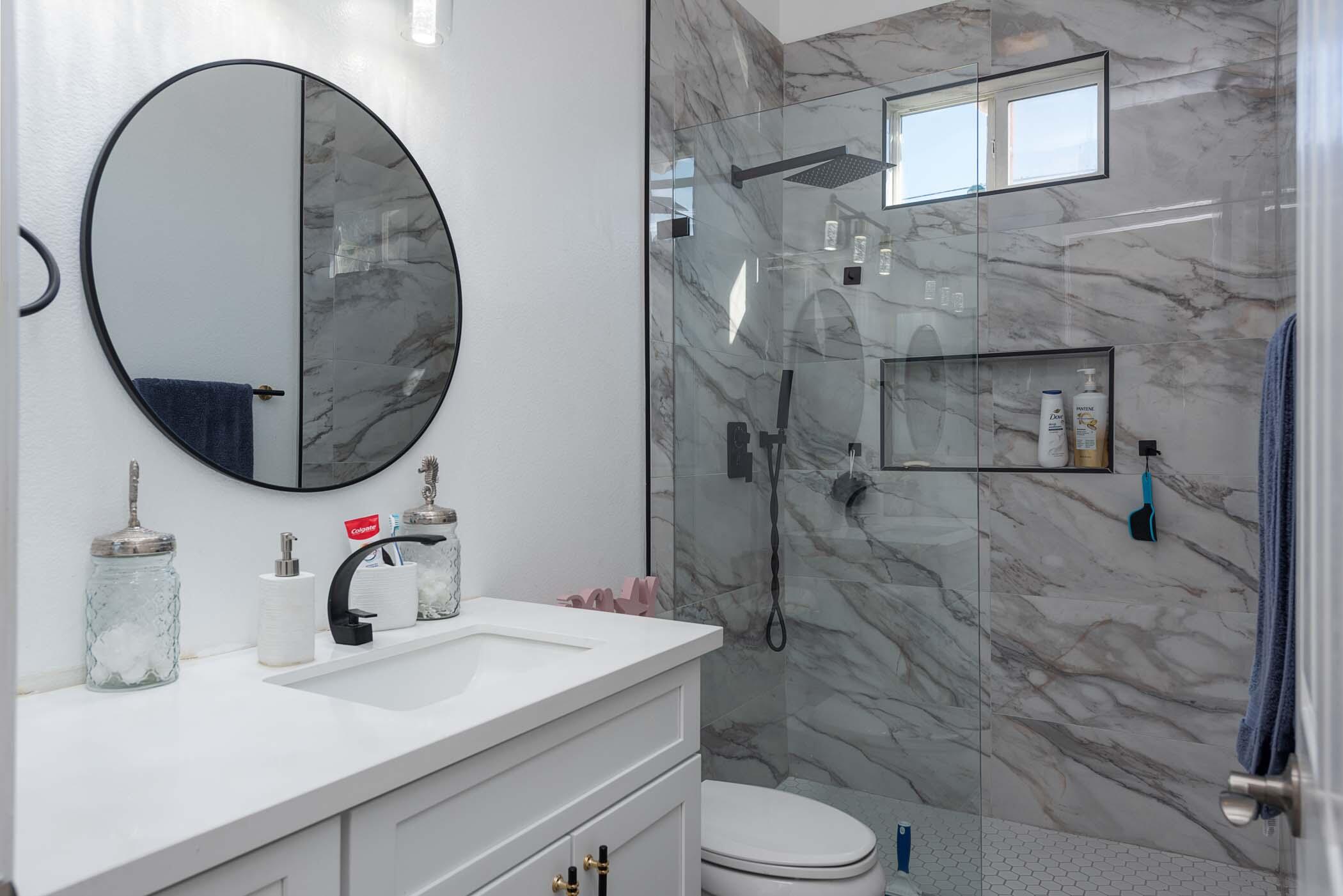 49534 Lewis Road Indio, CA 92201 - Photo 27 of 44 a bathroom with a sink and a mirror
