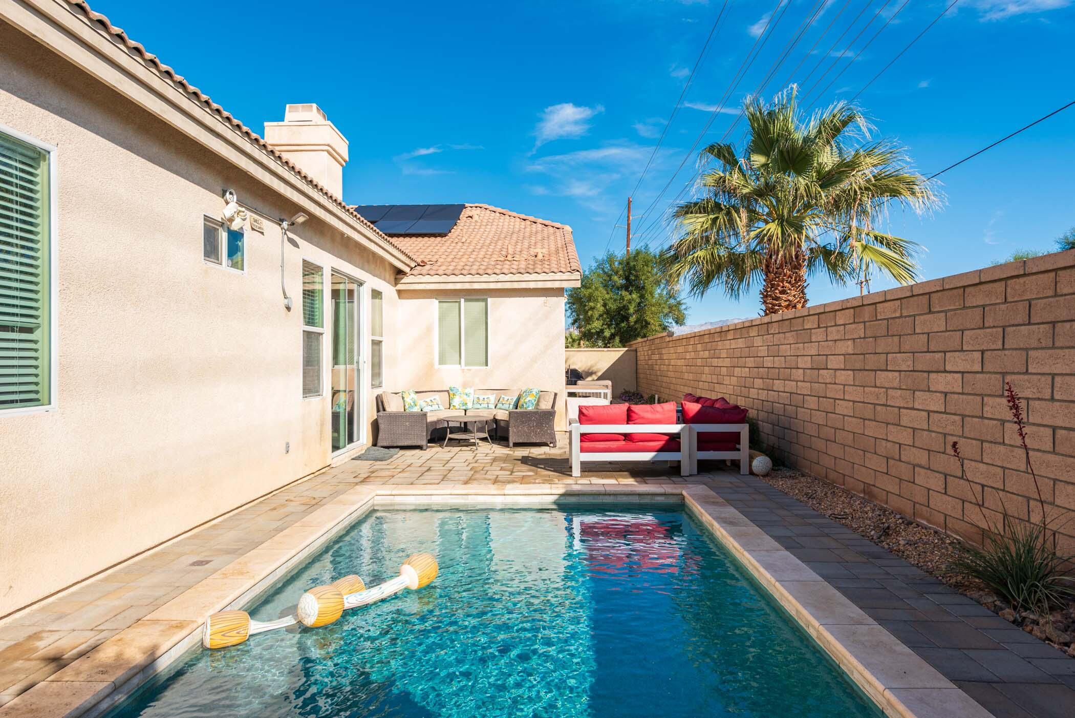 49534 Lewis Road Indio, CA 92201 - Photo 34 of 44 a house view with a sitting space and sitting space