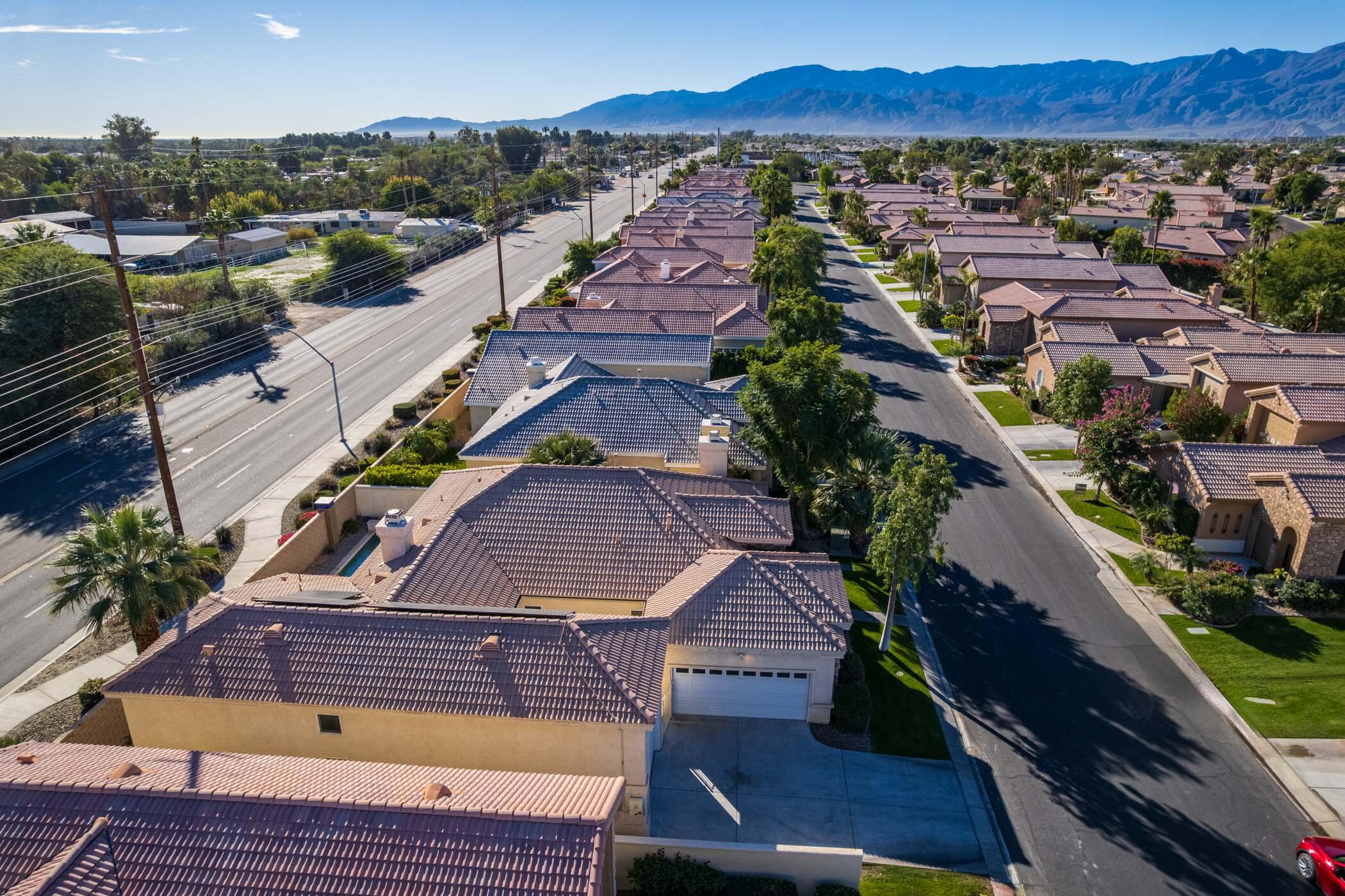 49534 Lewis Road Indio, CA 92201 - Photo 42 of 44 an aerial view of residential houses with outdoor space and ocean view