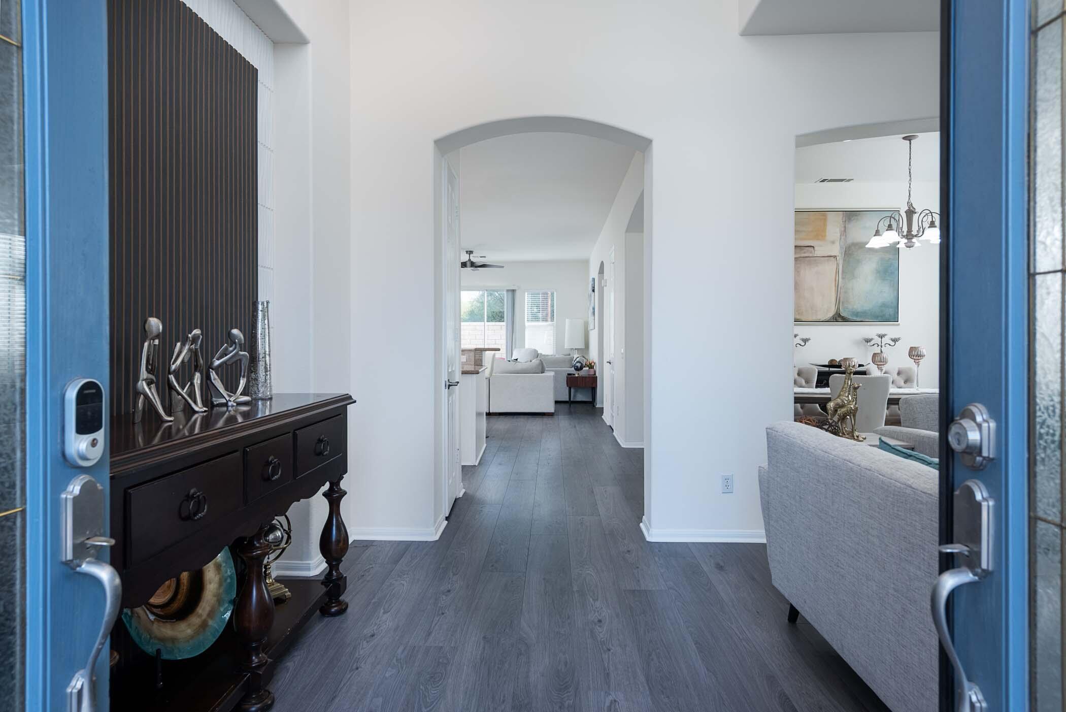 49534 Lewis Road Indio, CA 92201 - Photo 6 of 44 a view of a livingroom with wooden floor and furniture