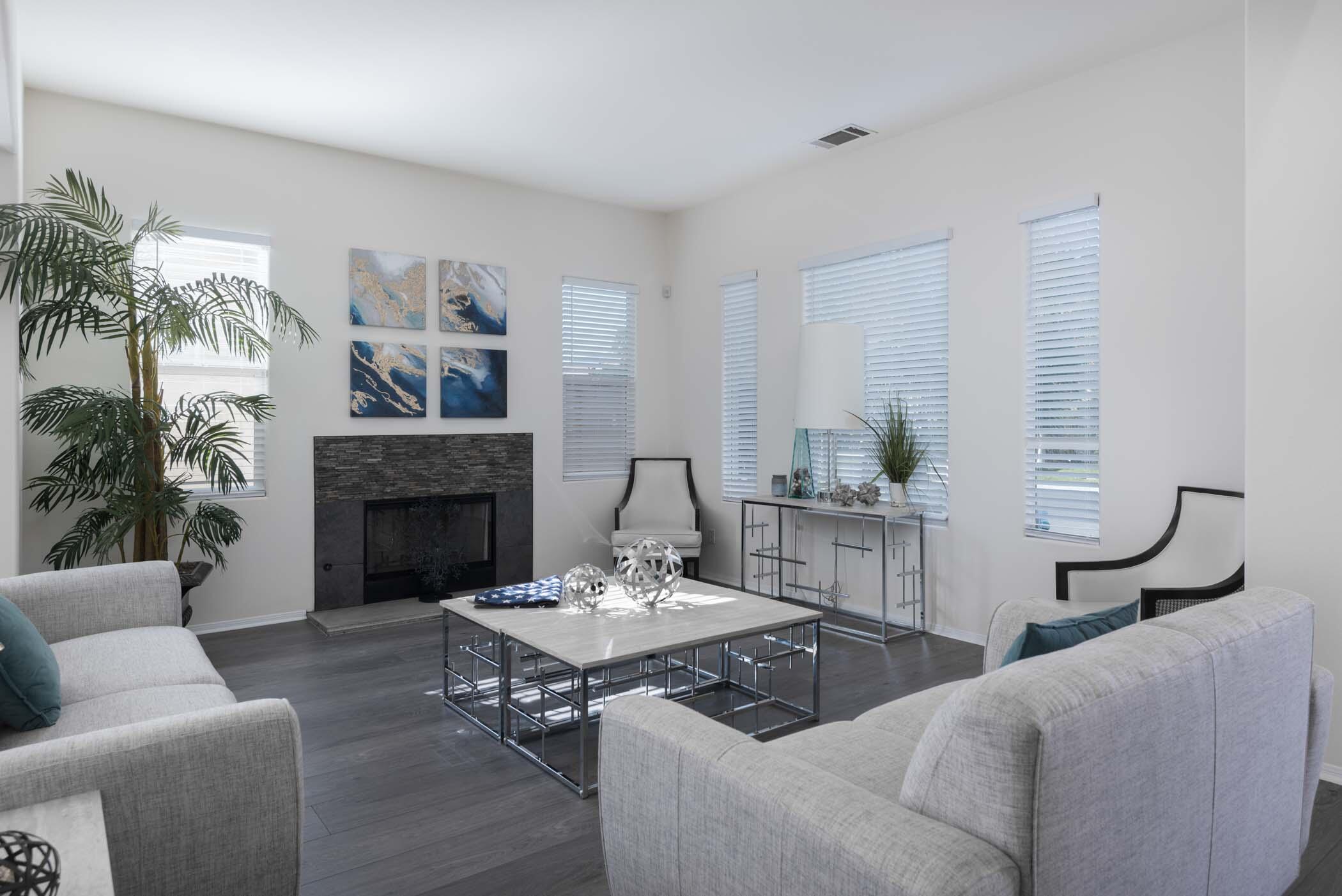 49534 Lewis Road Indio, CA 92201 - Photo 8 of 44 a living room with furniture and a fireplace