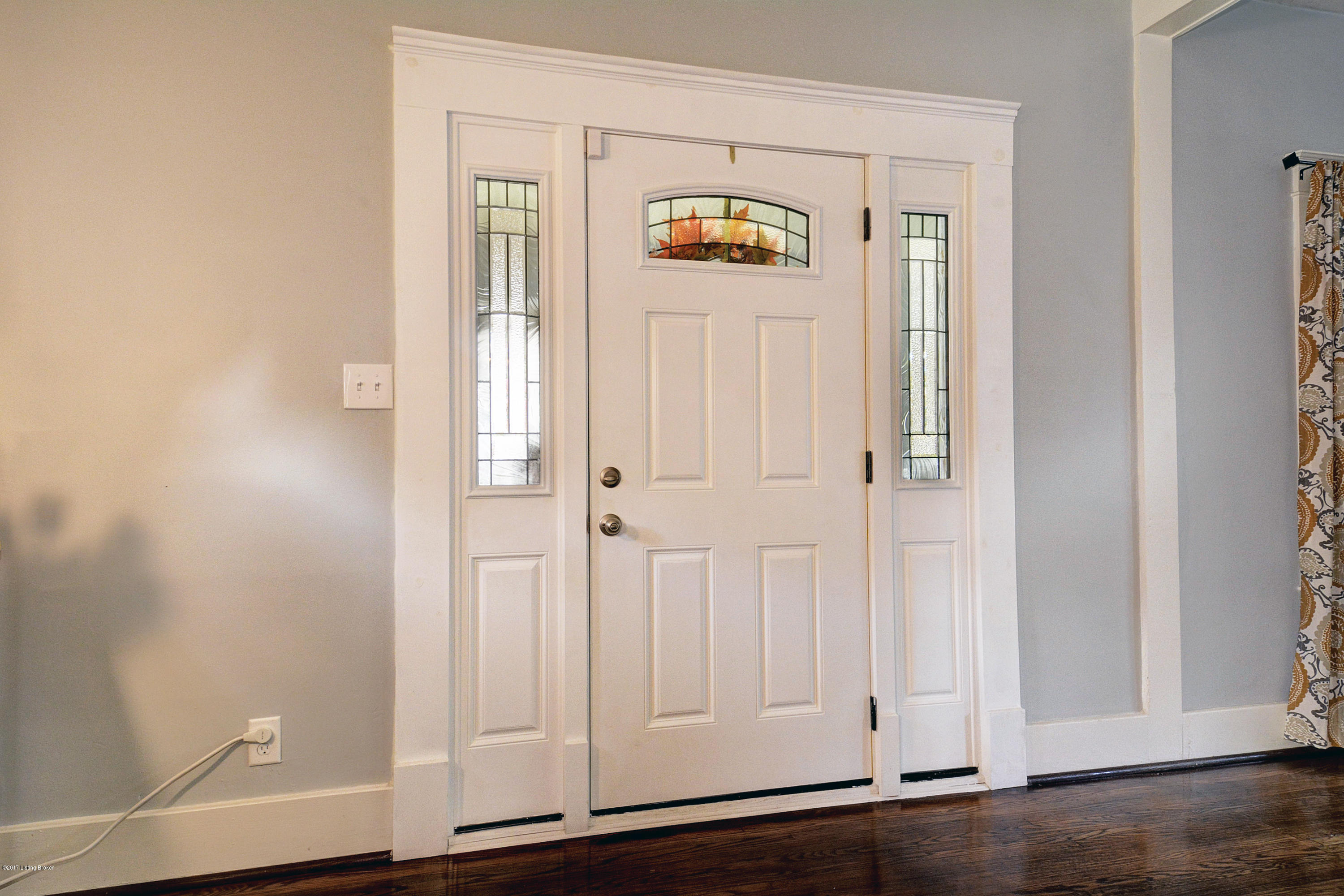 217 Iola Road Louisville, KY 40207 - Photo 8 of 44 Welcome your guests through the beautiful entry door, offering decorative glass and sidelights.