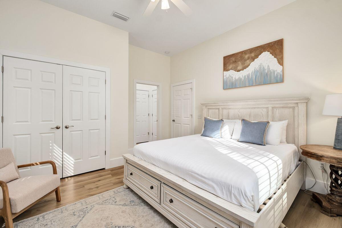 251 Dogwood Street Santa Rosa Beach, FL 32459 - Photo 23 of 51 a bedroom with a bed and a couch