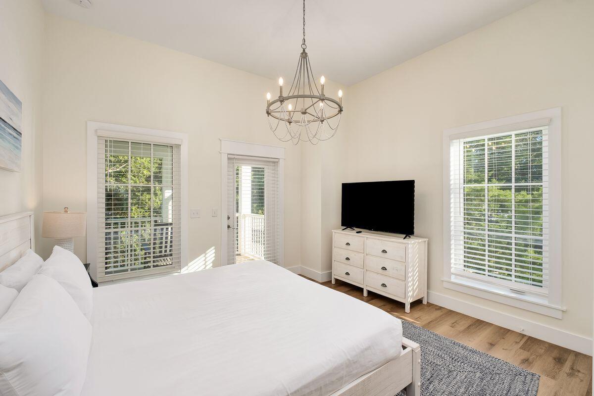 251 Dogwood Street Santa Rosa Beach, FL 32459 - Photo 34 of 51 a bedroom with bed tv and a window