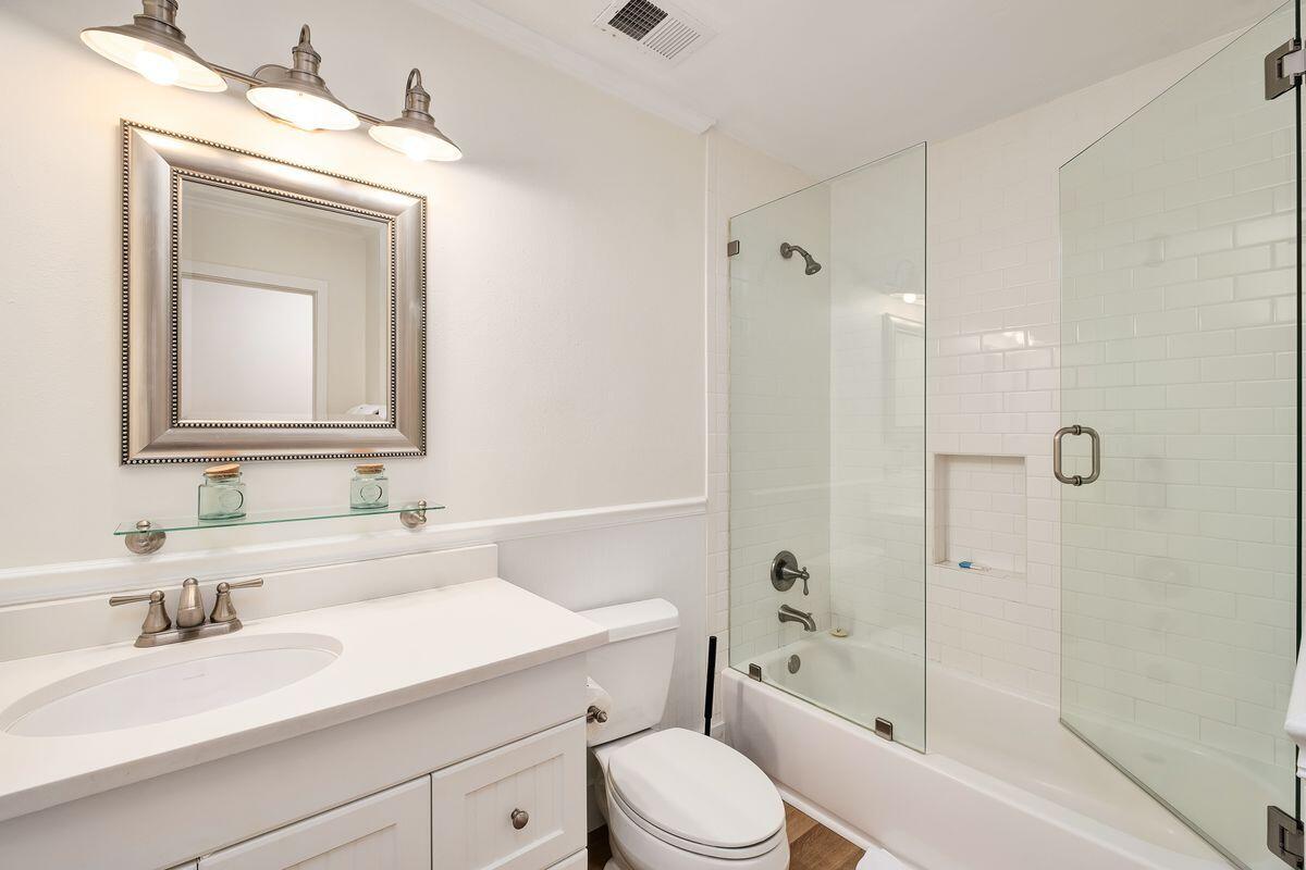 251 Dogwood Street Santa Rosa Beach, FL 32459 - Photo 41 of 51 a bathroom with a sink a toilet and shower