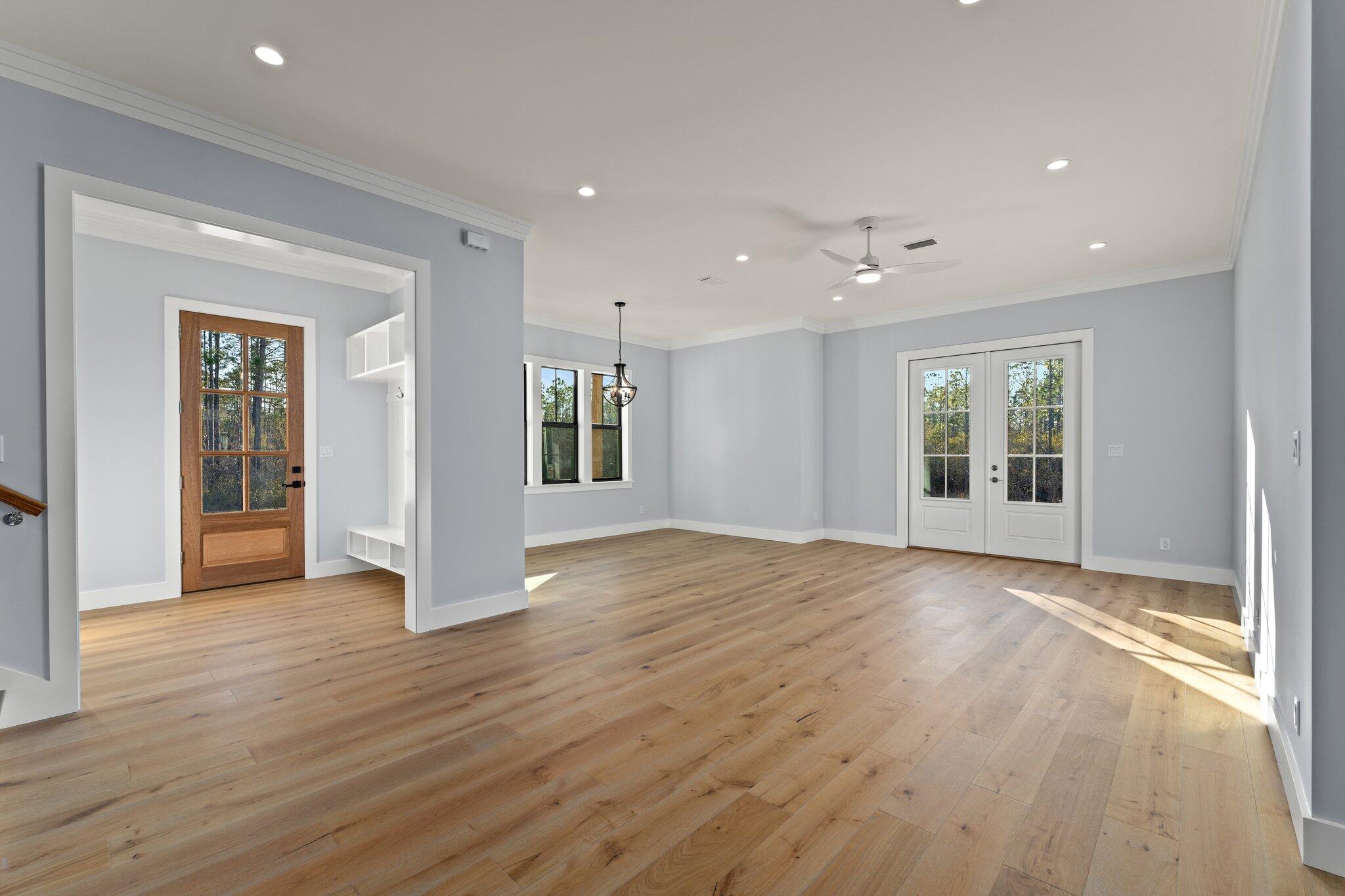 50 Cord Road Santa Rosa Beach, FL 32459 - Photo 11 of 73 a view of an empty room with wooden floor and a window