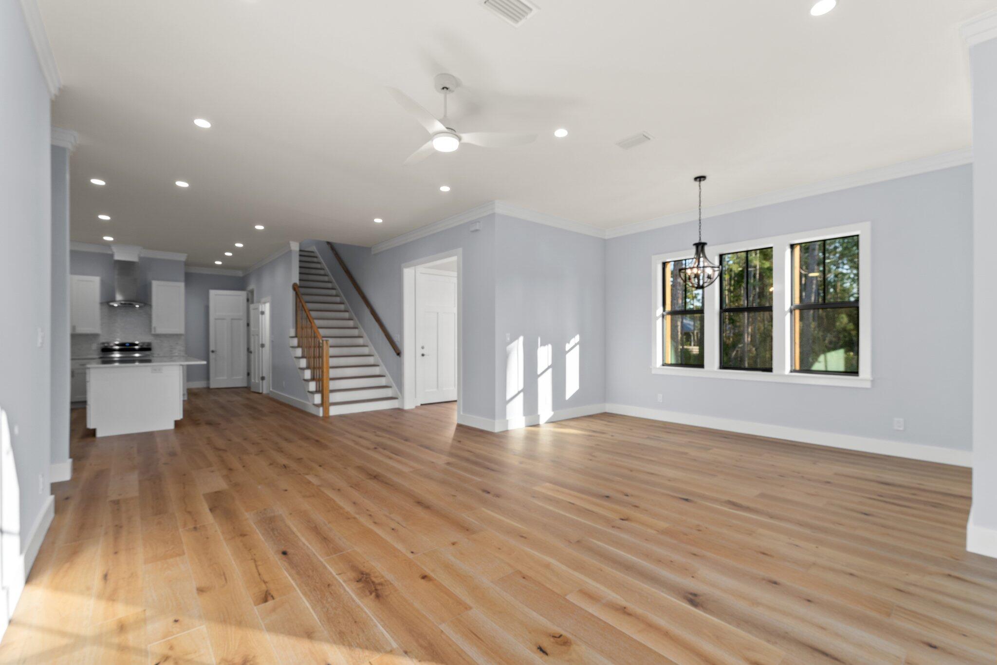 50 Cord Road Santa Rosa Beach, FL 32459 - Photo 14 of 73 a view of an empty room with wooden floor and a window