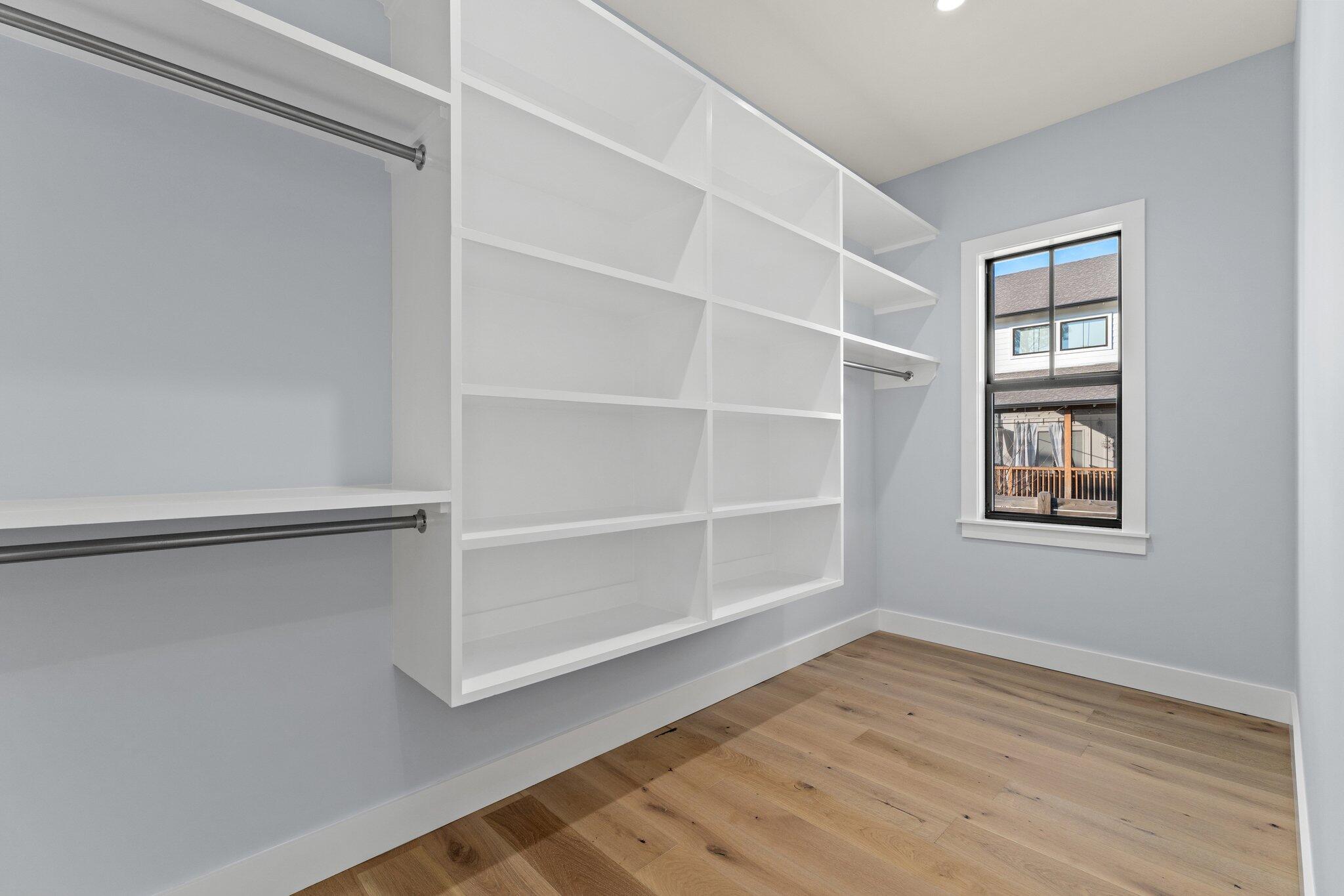 50 Cord Road Santa Rosa Beach, FL 32459 - Photo 25 of 73 a view of an empty room with wooden floor and a window