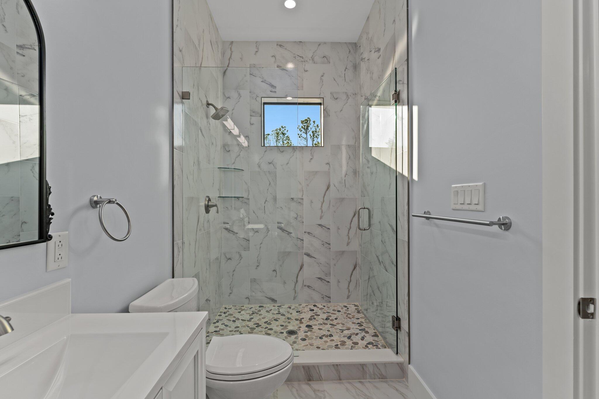 50 Cord Road Santa Rosa Beach, FL 32459 - Photo 27 of 73 a bathroom with a toilet sink and shower