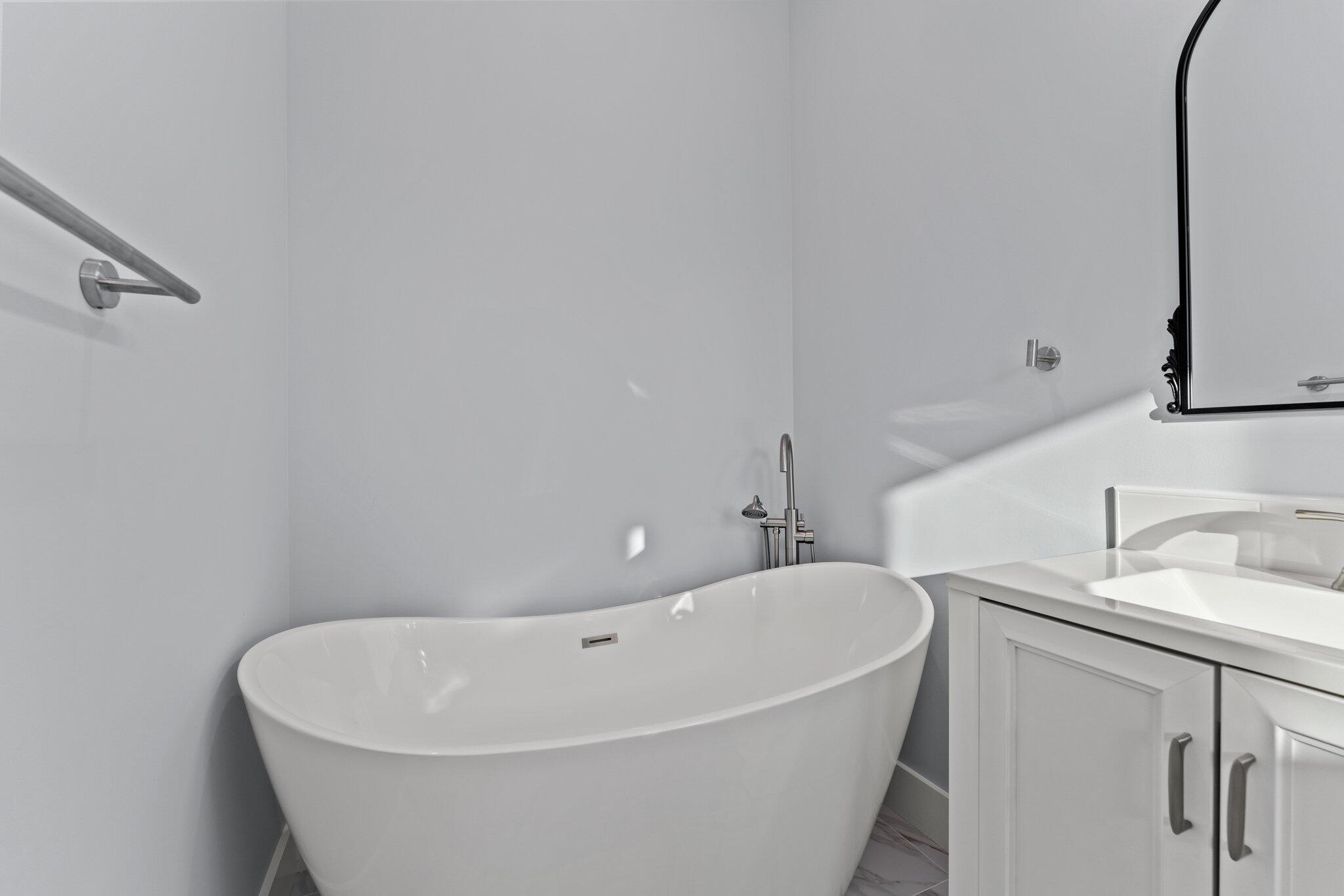 50 Cord Road Santa Rosa Beach, FL 32459 - Photo 28 of 73 a white bath tub sitting in a bathroom