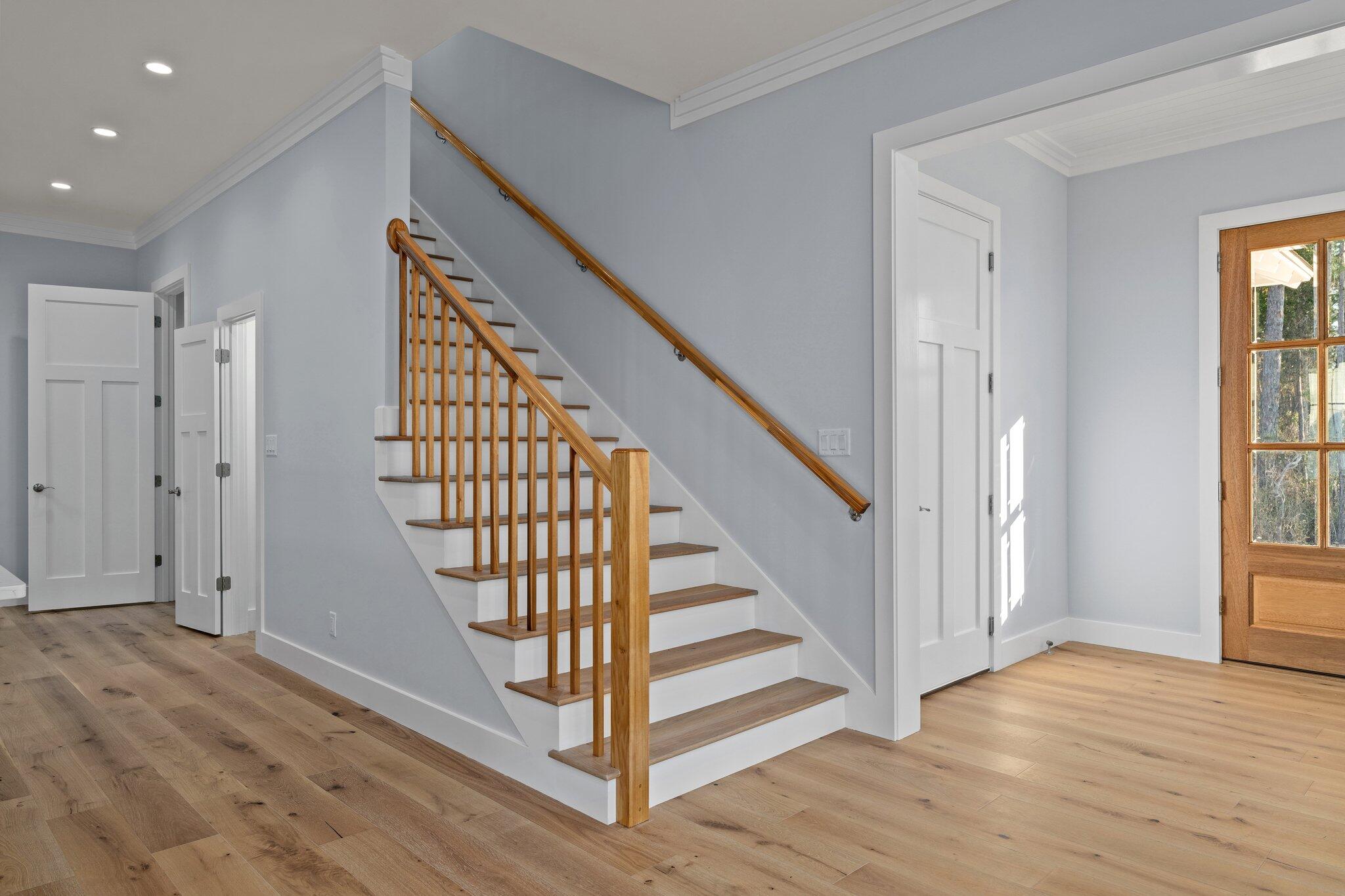 50 Cord Road Santa Rosa Beach, FL 32459 - Photo 37 of 73 a view of a hallway with wooden floor and entryway