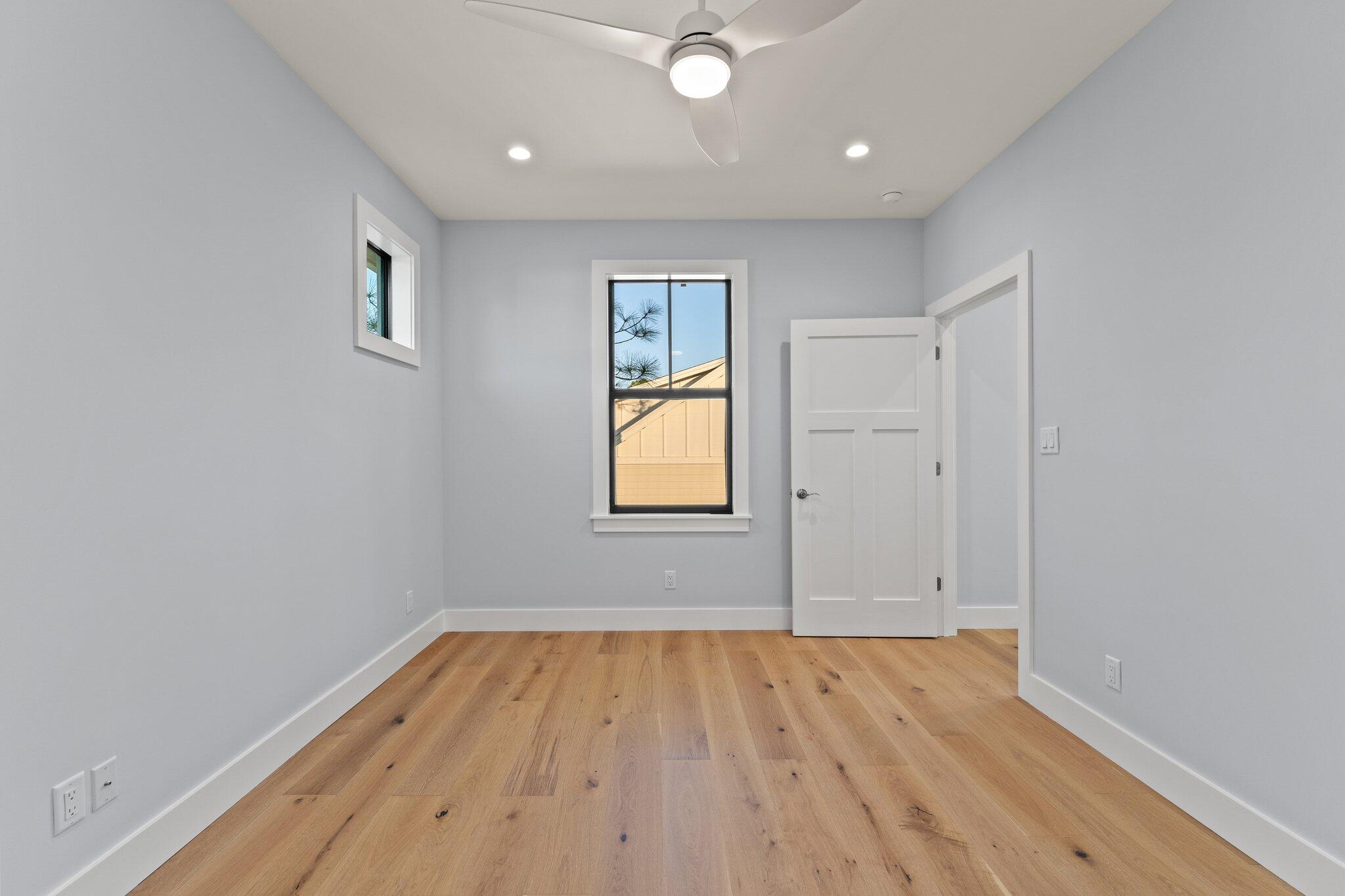 50 Cord Road Santa Rosa Beach, FL 32459 - Photo 40 of 73 wooden floor in an empty room with a window