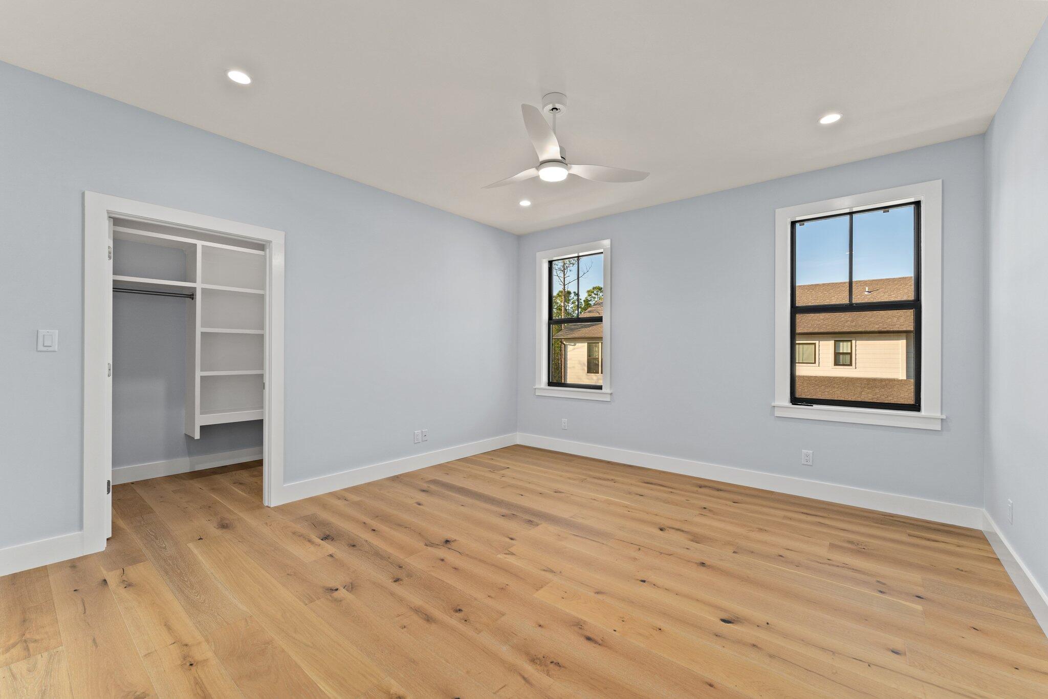 50 Cord Road Santa Rosa Beach, FL 32459 - Photo 44 of 73 wooden floor in an empty room with a window