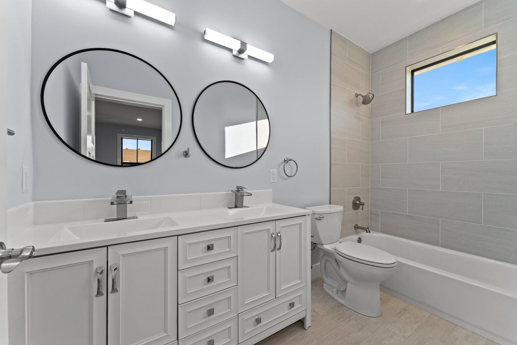 50 Cord Road Santa Rosa Beach, FL 32459 - Photo 47 of 73 a bathroom with a toilet a sink and a mirror