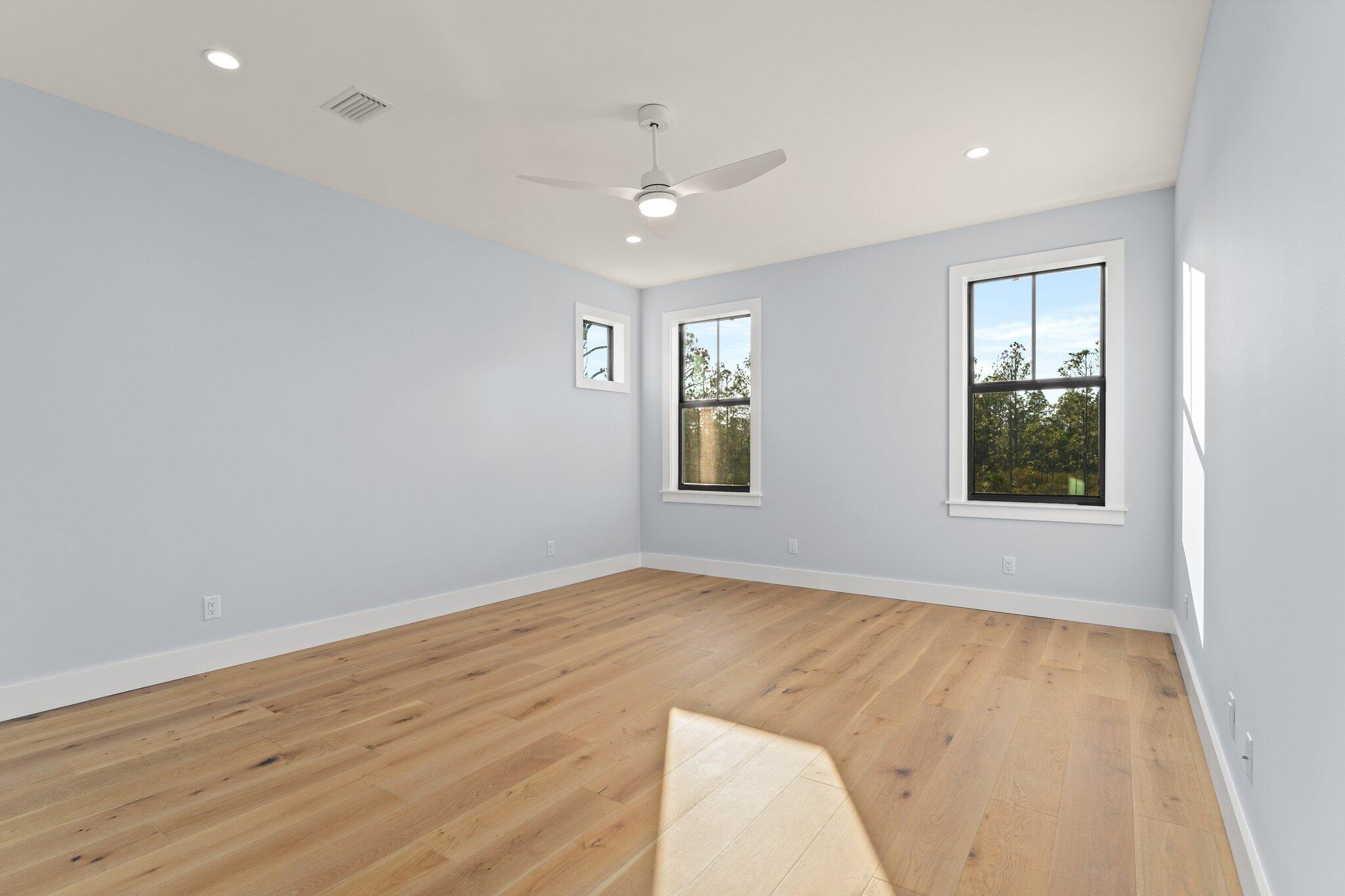 50 Cord Road Santa Rosa Beach, FL 32459 - Photo 48 of 73 a view of an empty room with wooden floor and a window