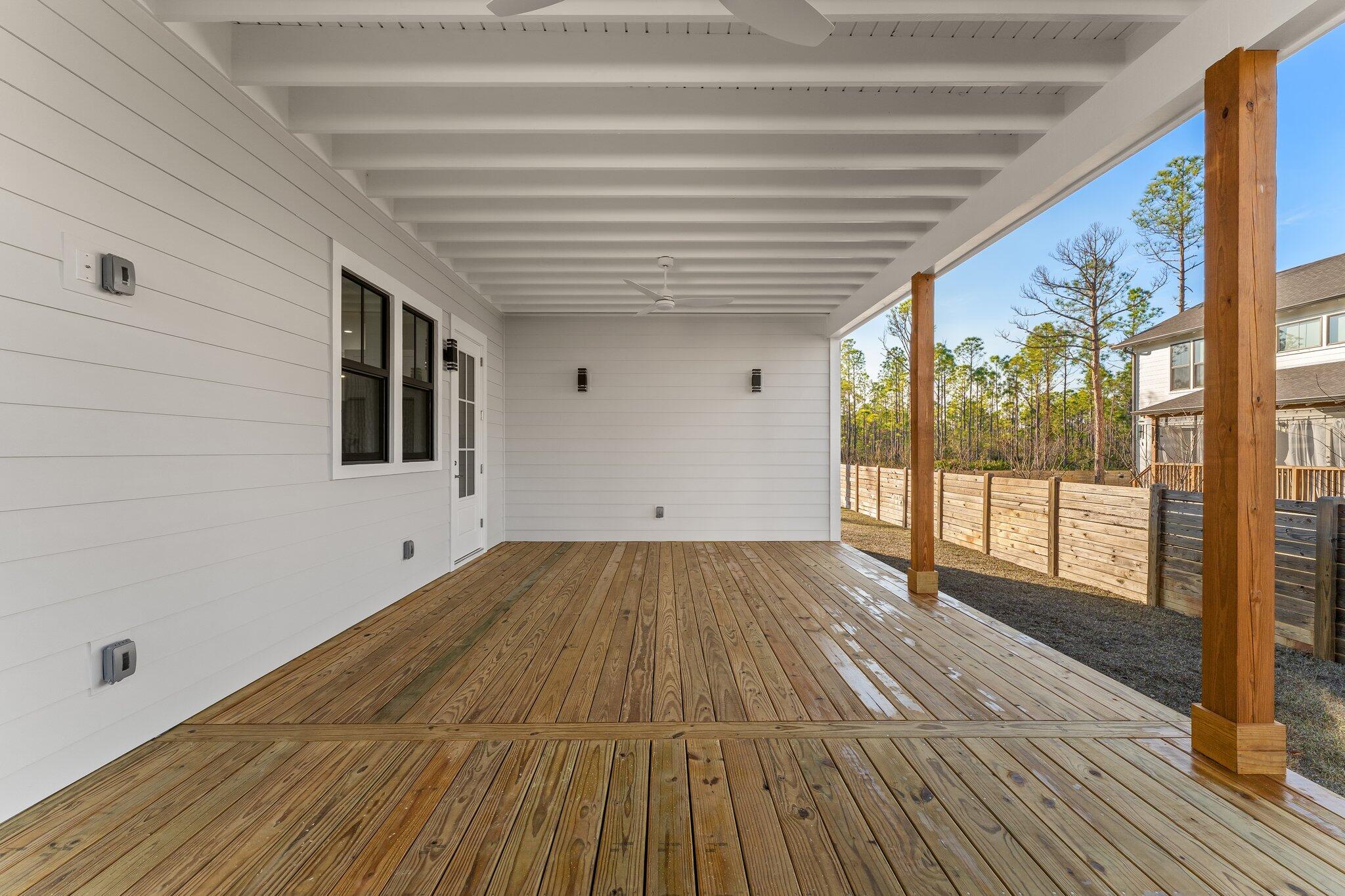 50 Cord Road Santa Rosa Beach, FL 32459 - Photo 56 of 73 a view of a room with wooden floor and iron stairs