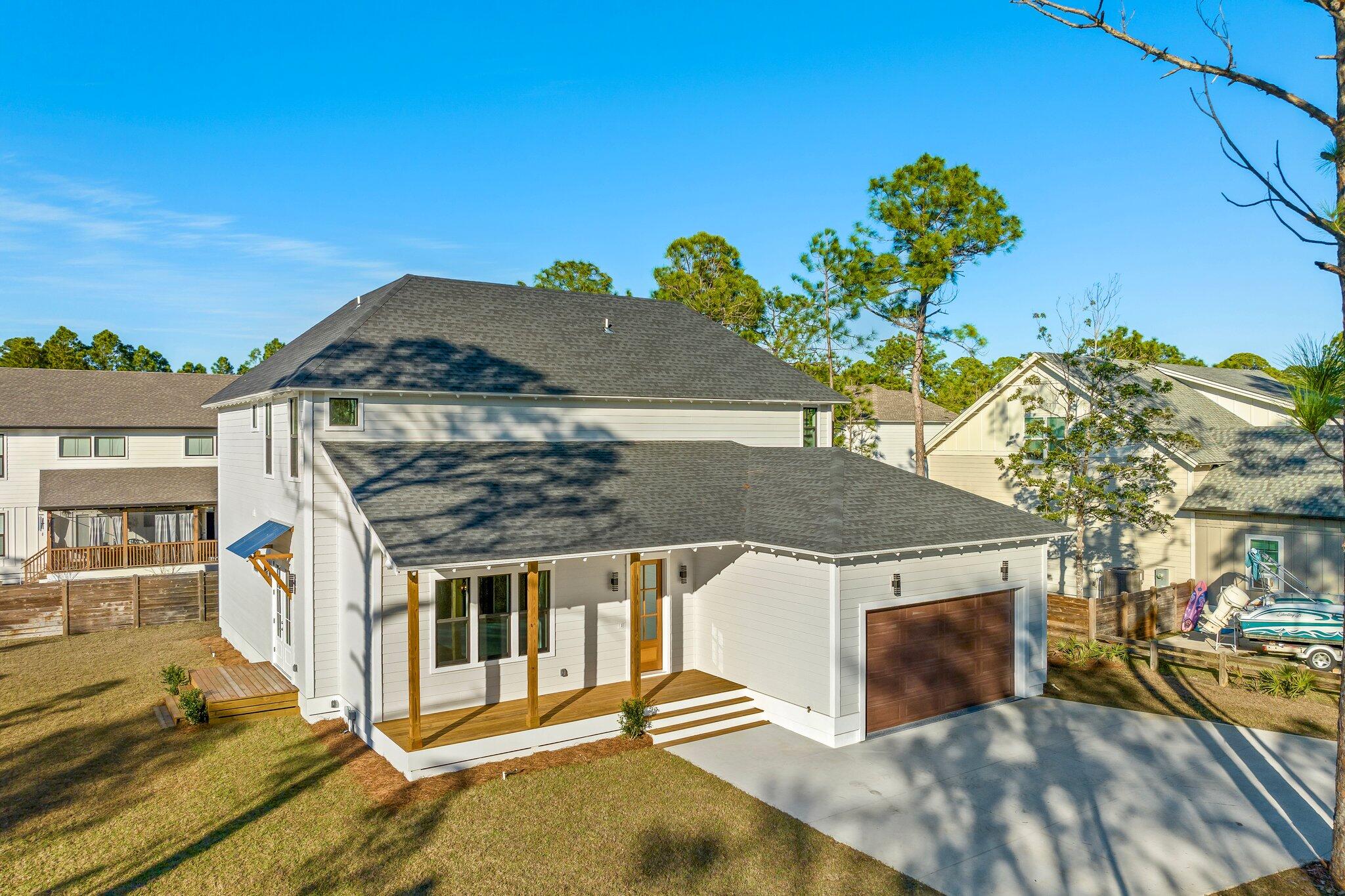 50 Cord Road Santa Rosa Beach, FL 32459 - Photo 63 of 73 a view of a house with a yard