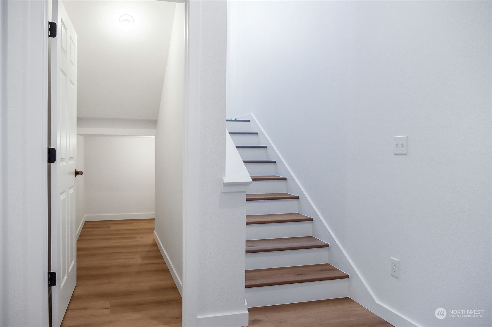 431 Strand Road Ephrata, WA 98823 - Photo 16 of 39 a view of a hallway with wooden floor and entryway