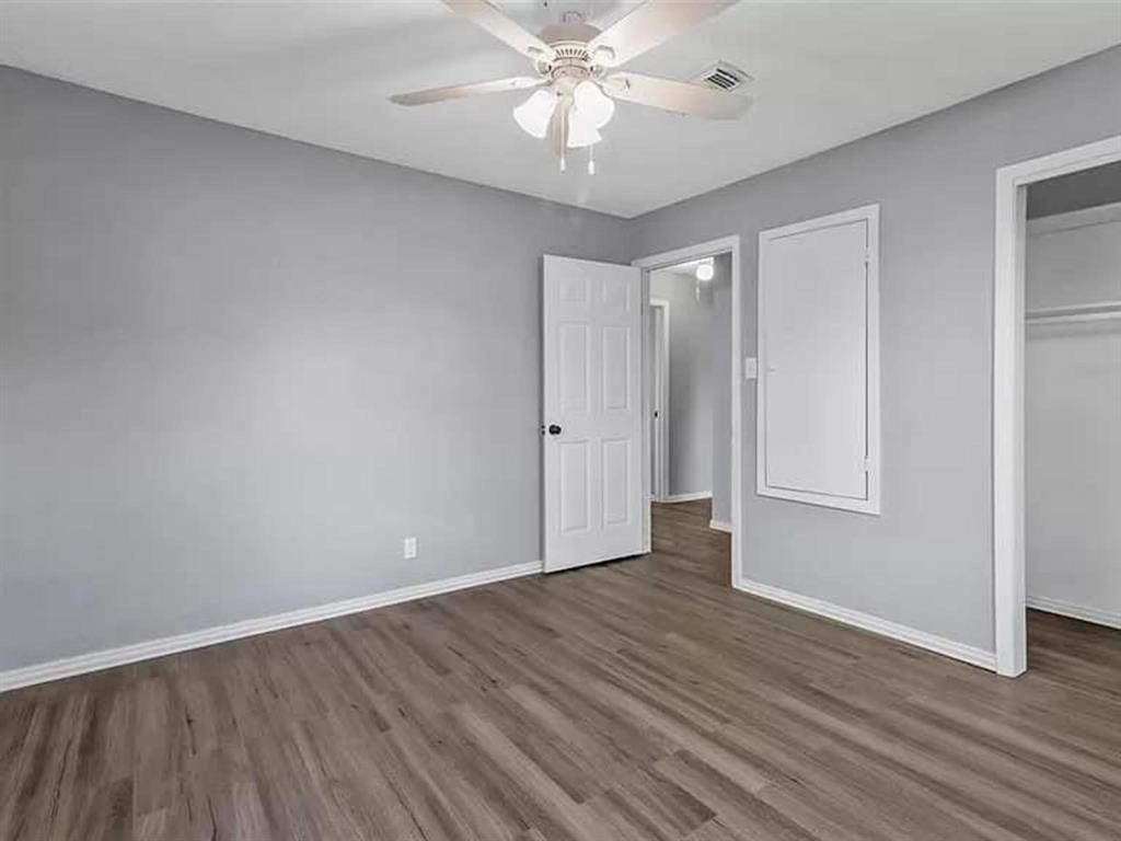 732 East Morton Street Denison, TX 75021 - Photo 14 of 14 a view of an empty room with wooden floor