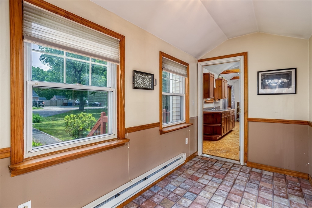 216 Dunstable Road North Chelmsford, MA 01863 - Photo 24 of 42 a view of a big room with windows and refrigerator