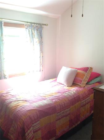 17 Adams Road Sturbridge, MA 01566 - Photo 18 of 25 a bedroom with a bed and a window