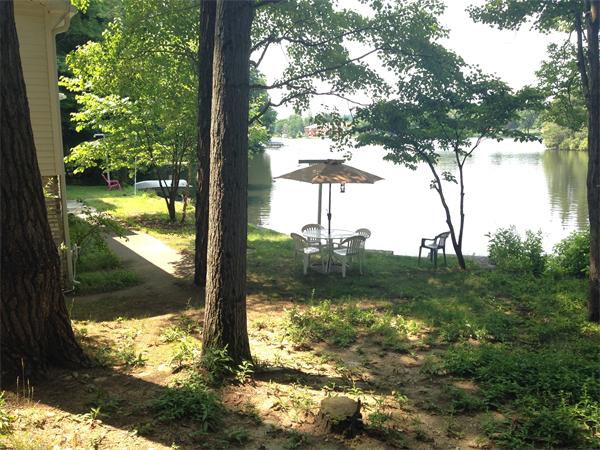 17 Adams Road Sturbridge, MA 01566 - Photo 4 of 25 a view of lake from a yard