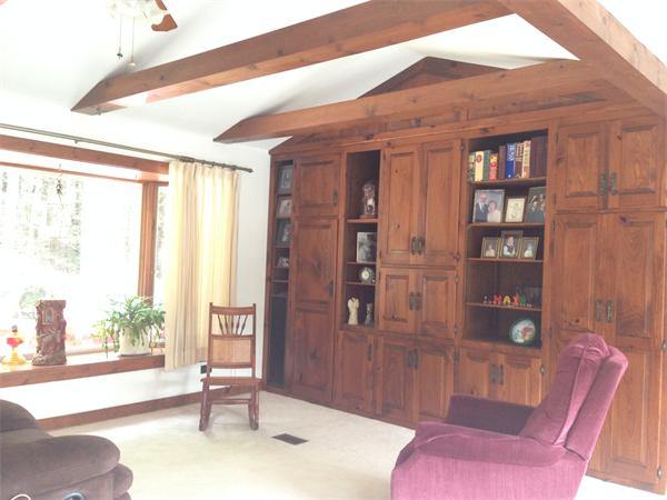 17 Adams Road Sturbridge, MA 01566 - Photo 8 of 25 a living room with furniture a window and a table