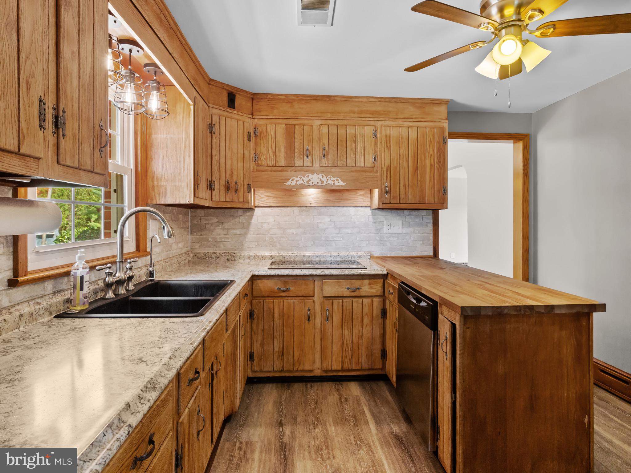 14958 New Windsor Road New Windsor, MD 21776 - Photo 12 of 38 Refinished Cabinets
