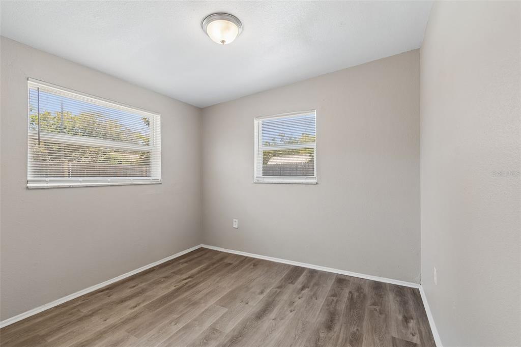 9228 82nd Way Seminole, FL 33777 - Photo 19 of 35 an empty room with a window