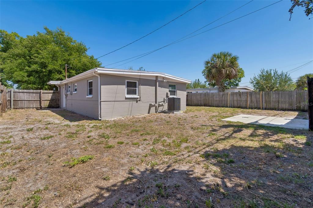 9228 82nd Way Seminole, FL 33777 - Photo 31 of 35 a view of a house with a yard