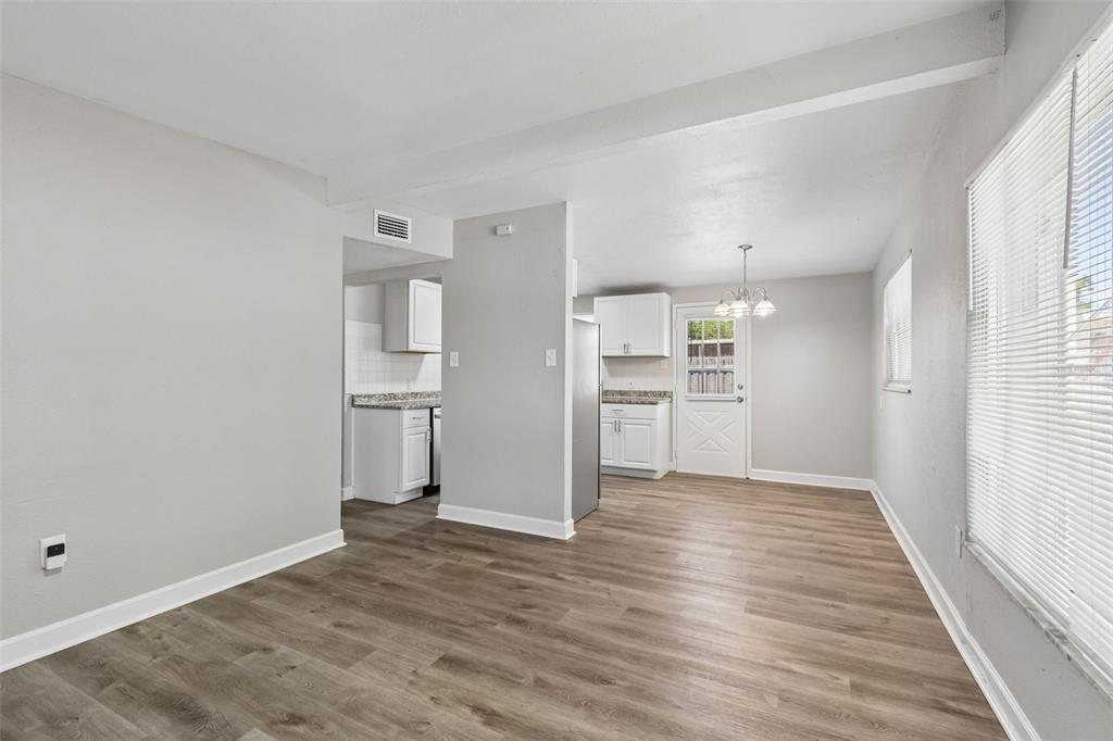 9228 82nd Way Seminole, FL 33777 - Photo 7 of 35 a view of a kitchen with wooden floor and a kitchen