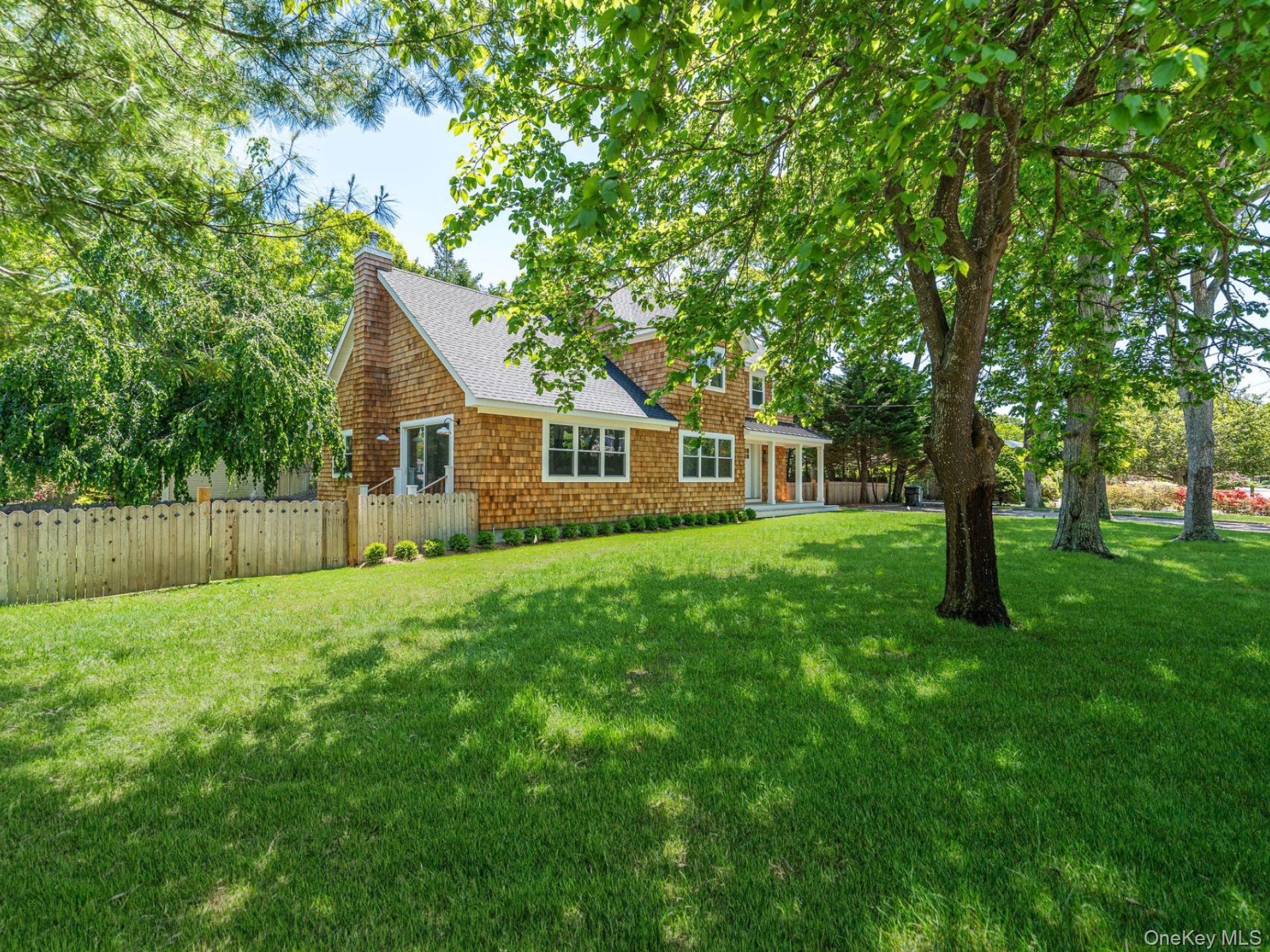 2 Heather Drive Remsenburg, NY 11960 - Photo 3 of 40 a house view with a garden space