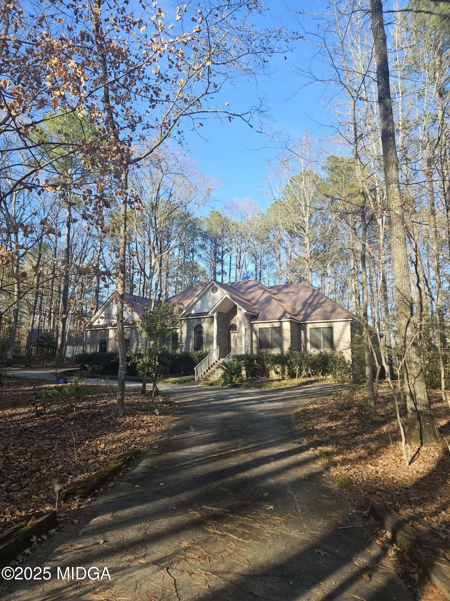 103 Oakview Circle Gray, GA 31032 - Photo 2 of 61 a front view of a house with a yard