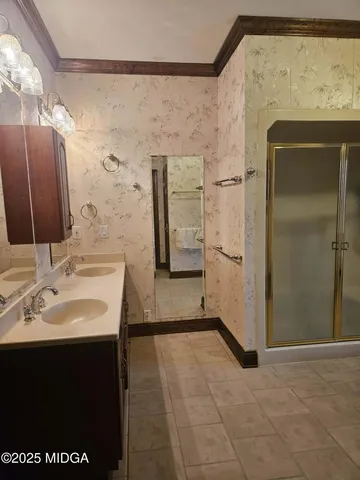 a bathroom with a shower and a toilet