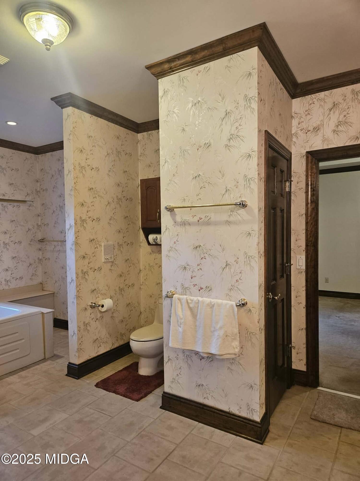 103 Oakview Circle Gray, GA 31032 - Photo 30 of 61 a bathroom with a shower and a toilet