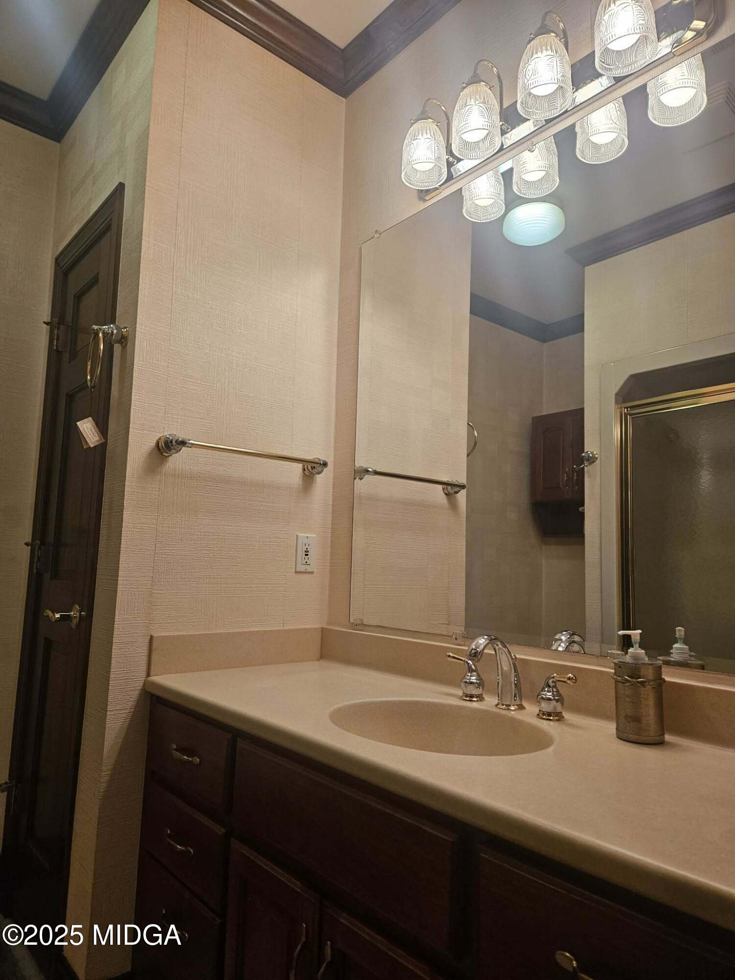 103 Oakview Circle Gray, GA 31032 - Photo 34 of 61 a bathroom with a sink and a mirror