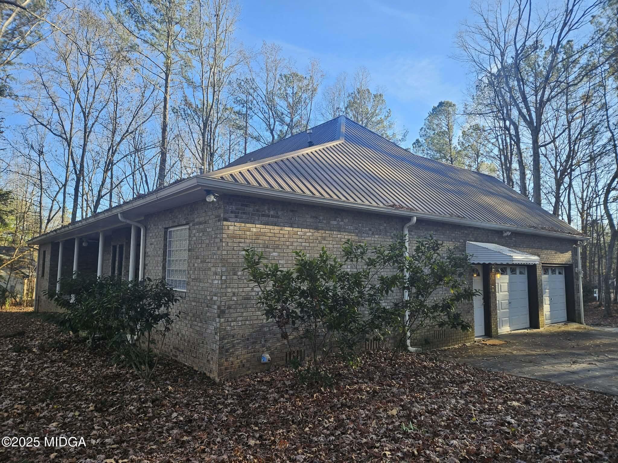 103 Oakview Circle Gray, GA 31032 - Photo 46 of 61 a front view of a house with garden