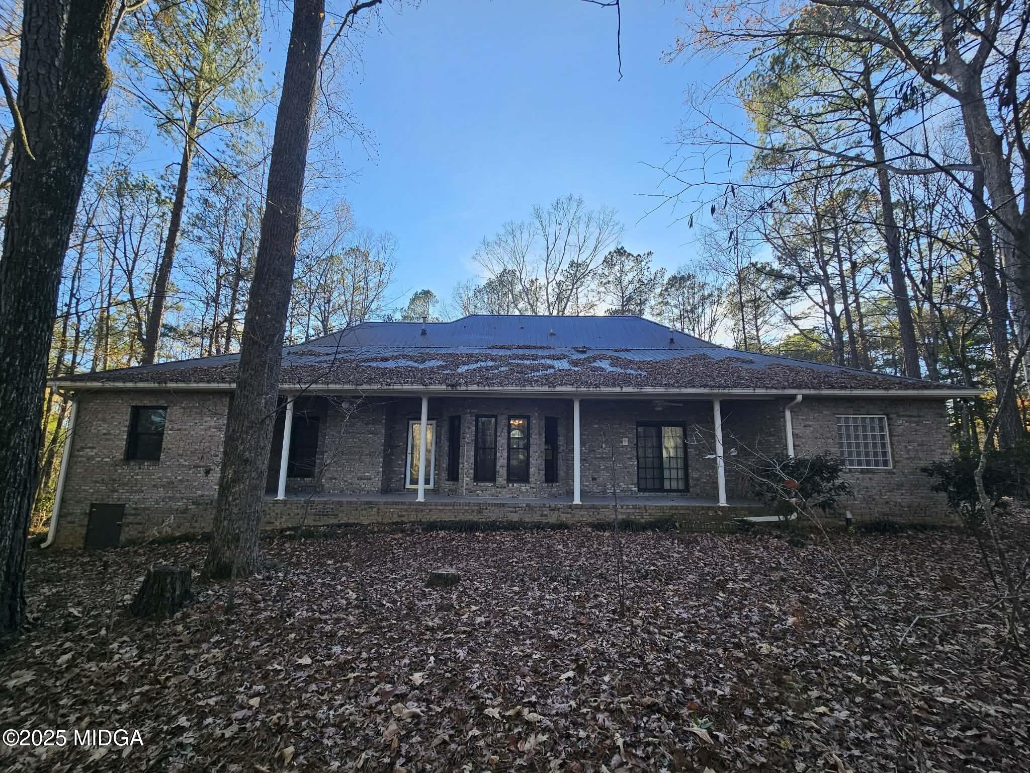 103 Oakview Circle Gray, GA 31032 - Photo 47 of 61 front view of a house with a garden