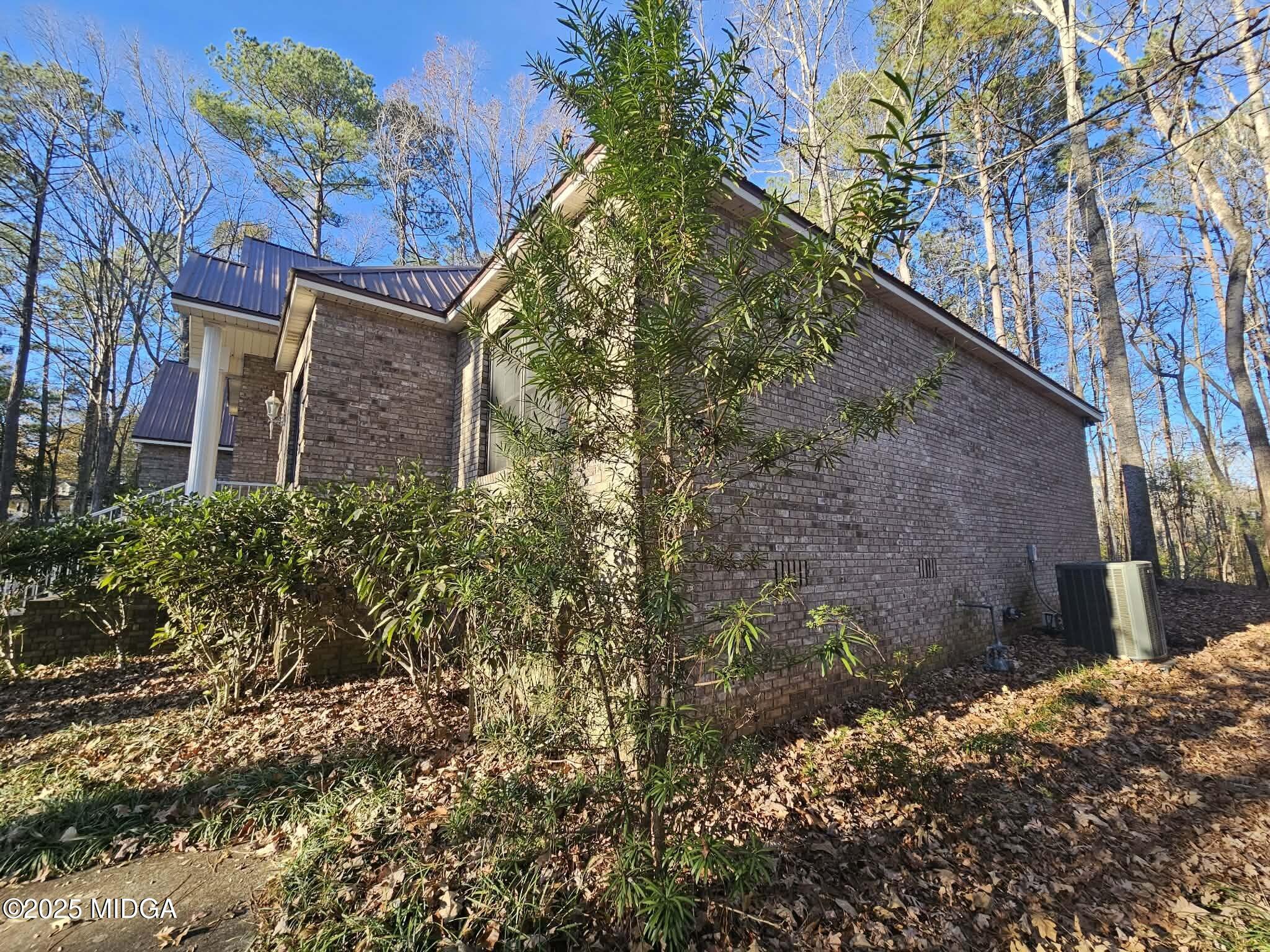 103 Oakview Circle Gray, GA 31032 - Photo 48 of 61 a backyard of a house with lots of green space
