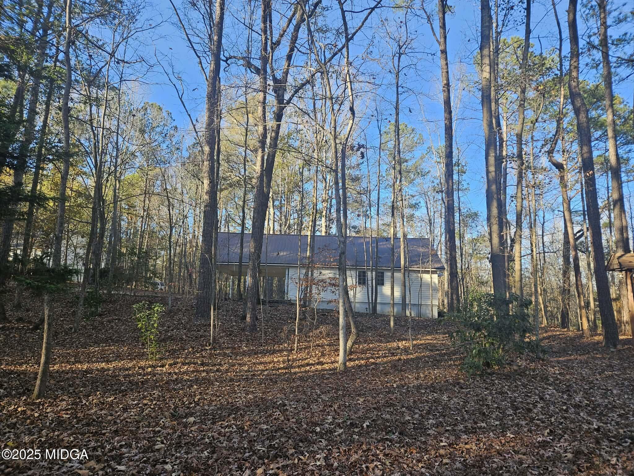 103 Oakview Circle Gray, GA 31032 - Photo 50 of 61 a backyard of a house with lots of green space