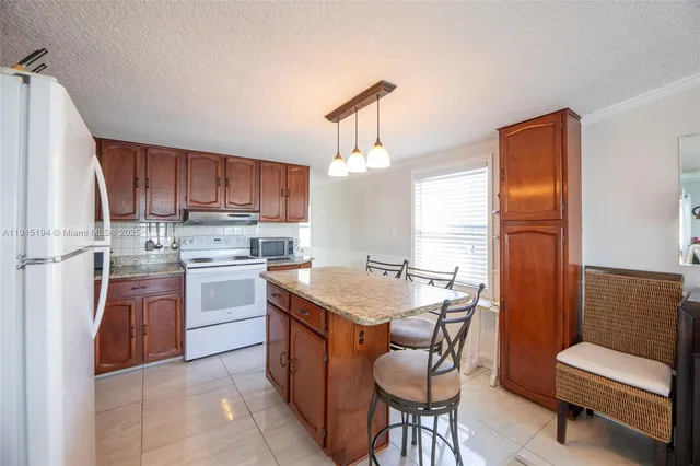 $379,900 | 112 Lake Shore Drive, Pembroke Park, FL 33009