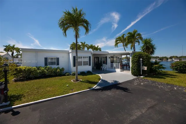 $379,900 | 112 Lake Shore Drive, Pembroke Park, FL 33009
