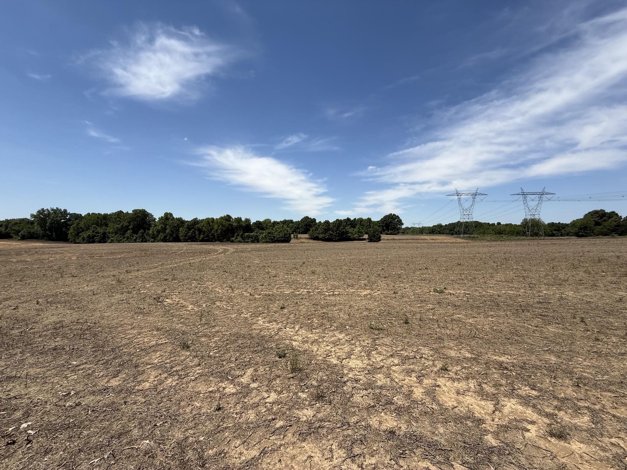 0 Mudville Road Atoka, TN 38004 - Photo 5 of 10 a view of a lake with houses in the back