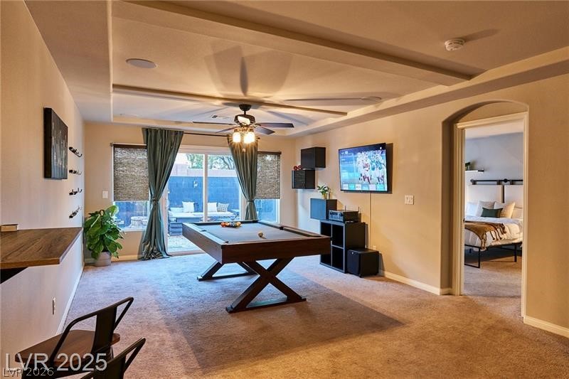 6302 Jackson Spring Road Las Vegas, NV 89118 - Photo 7 of 23 A vibrant game room with a pool table and inviting patio access creates an ideal entertainment hub.