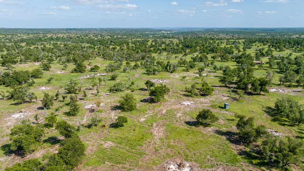 2 Loudon Road, Unit 2 Fredericksburg, TX 78624 - Photo 4 of 10 a view of a yard with an outdoor space