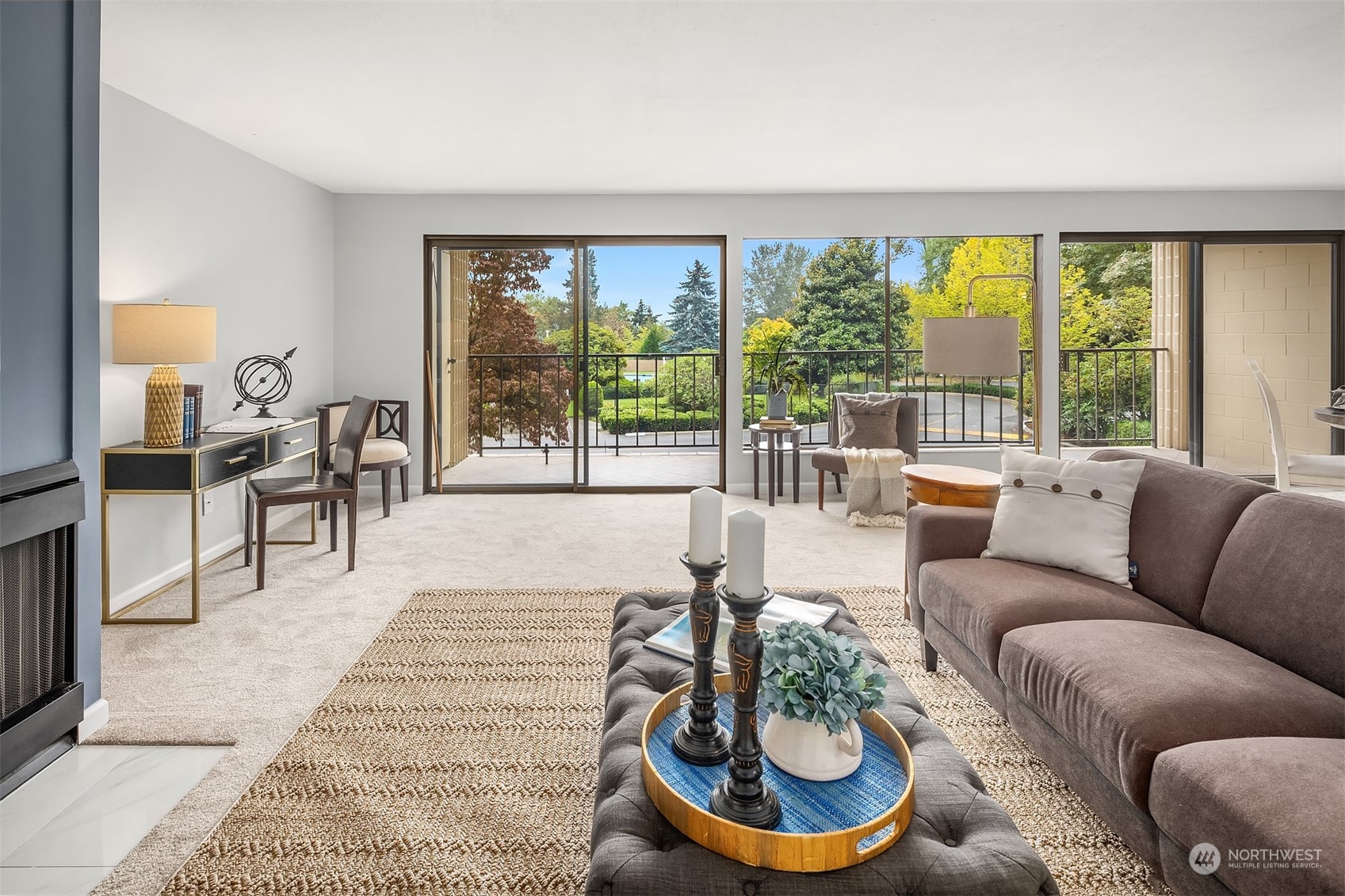 8001 Sand Point Way Northeast, Unit C22 Seattle, WA 98115 - Photo 11 of 27 a living room with furniture and a large window