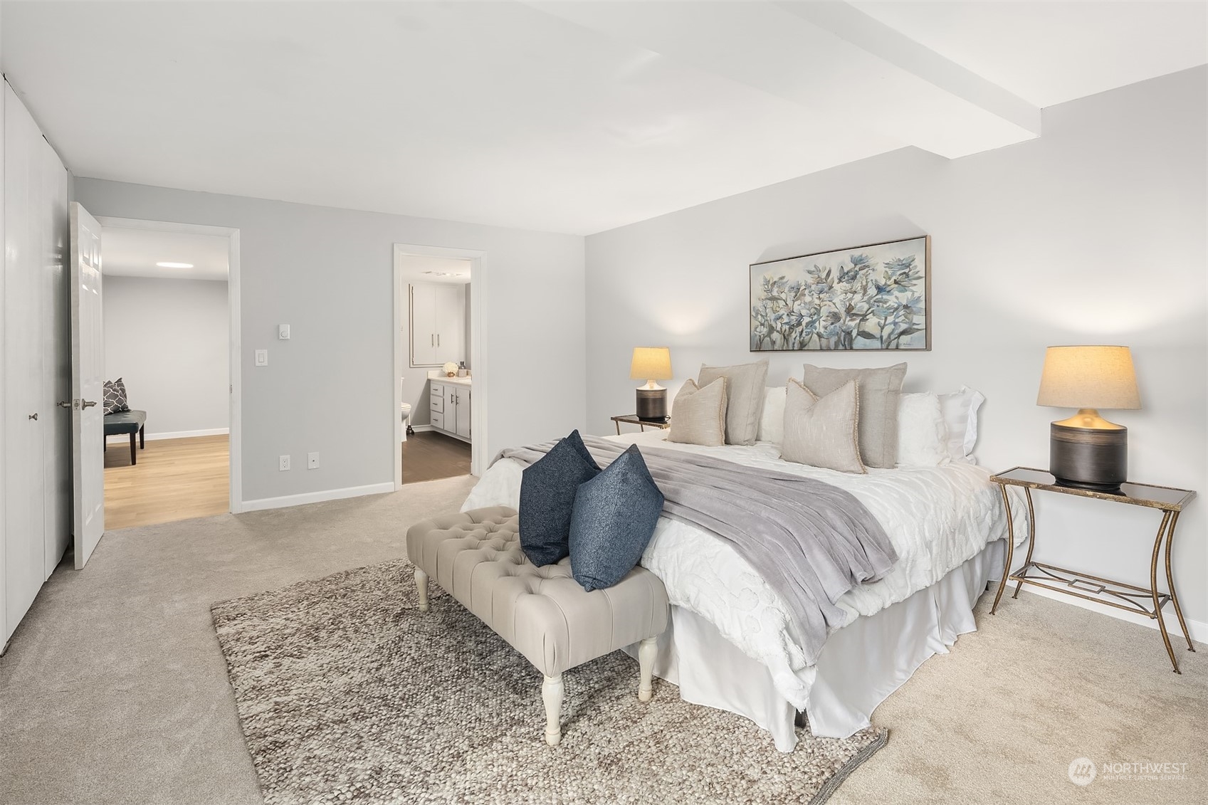 8001 Sand Point Way Northeast, Unit C22 Seattle, WA 98115 - Photo 15 of 27 a bedroom with a bed and a couch