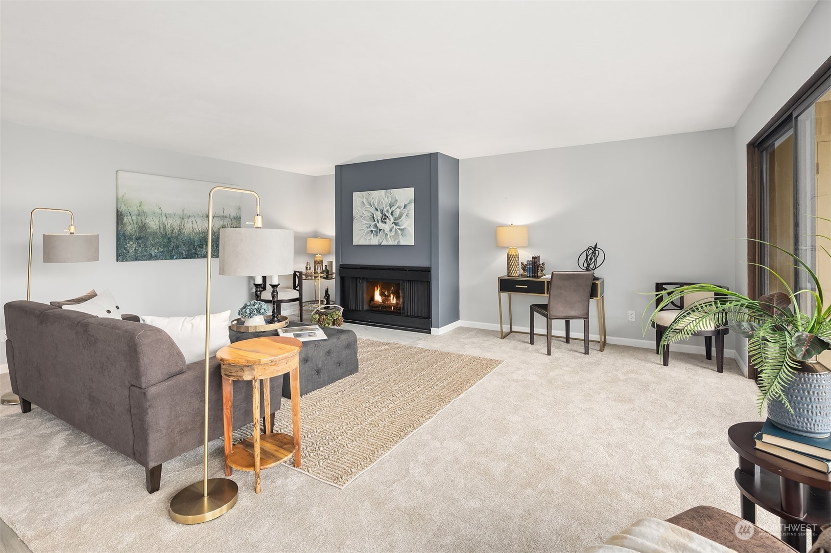 8001 Sand Point Way Northeast, Unit C22 Seattle, WA 98115 - Photo 4 of 27 a living room with furniture and a fireplace