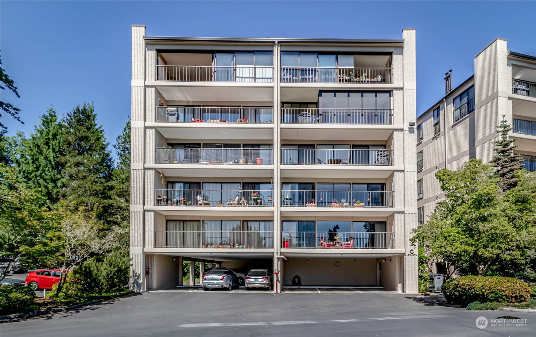 8001 Sand Point Way Northeast, Unit C22 Seattle, WA 98115 - Photo 7 of 27 a house with outdoor space