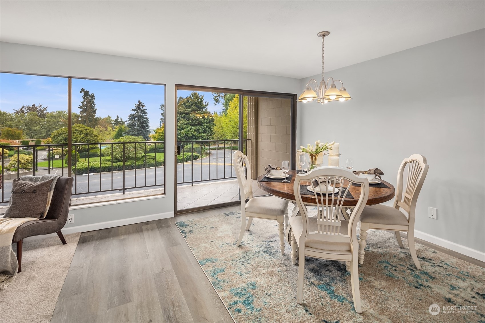 8001 Sand Point Way Northeast, Unit C22 Seattle, WA 98115 - Photo 9 of 27 a view of a dining room with furniture window and outside view